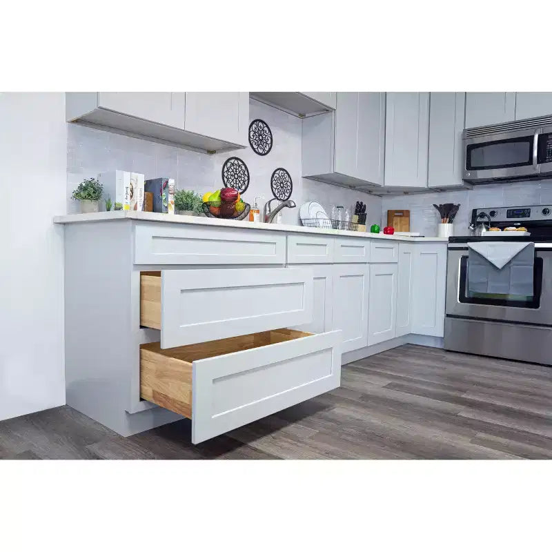Mueble bajo de cocina estilo Shaker en gris paloma con puerta y cajones dobles, montaje para 1 persona